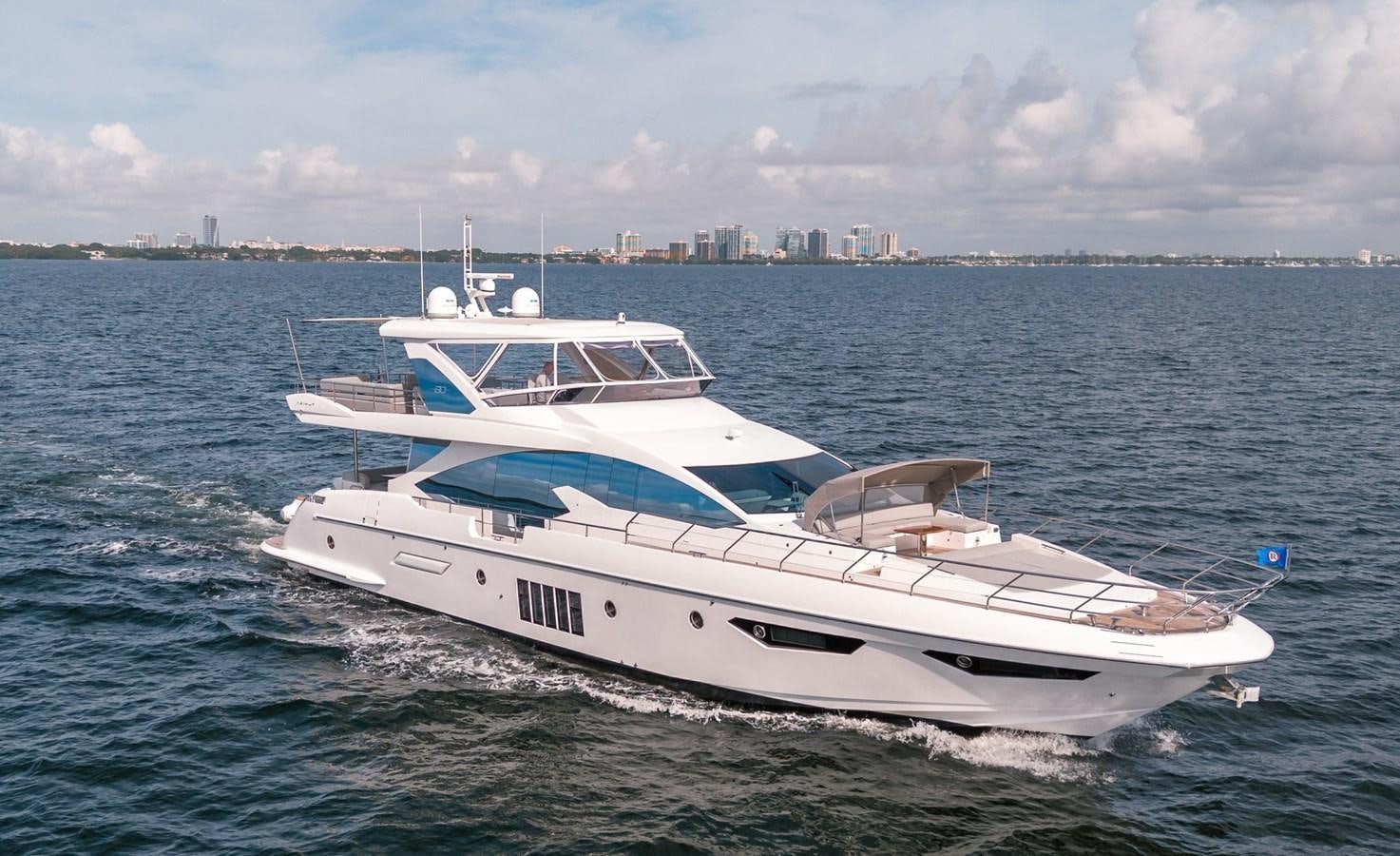 a white yacht on the water aboard 80 AZIMUT Yacht for Sale