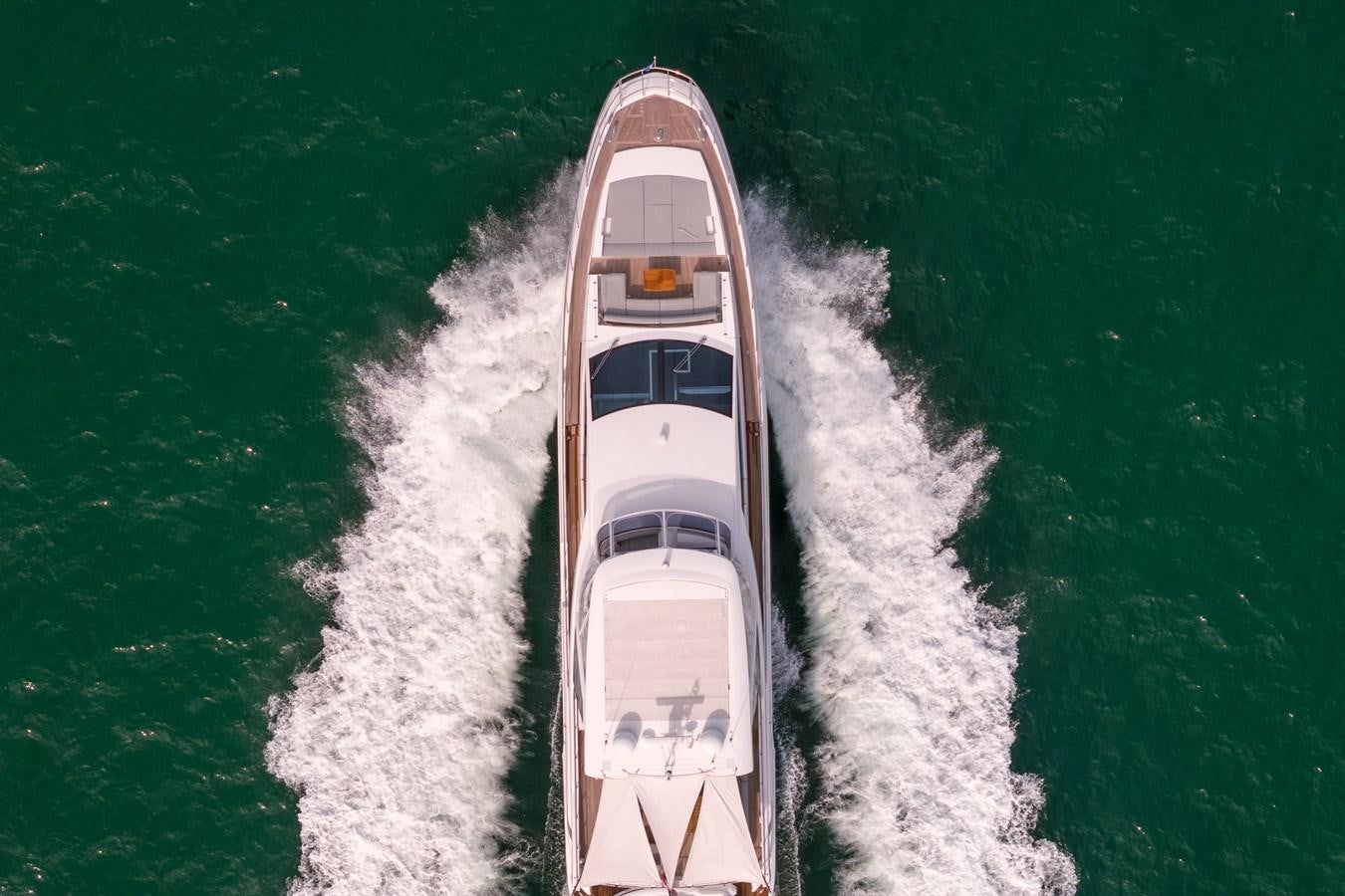 a long white boat on water aboard 80 AZIMUT Yacht for Sale