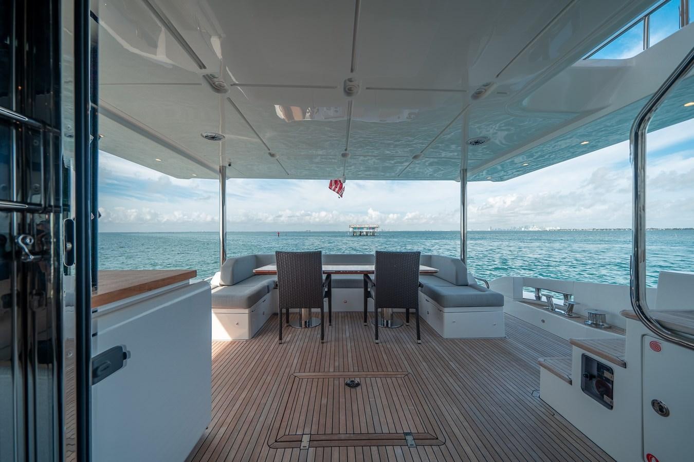 a room with a view of the ocean and a deck aboard 80 AZIMUT Yacht for Sale