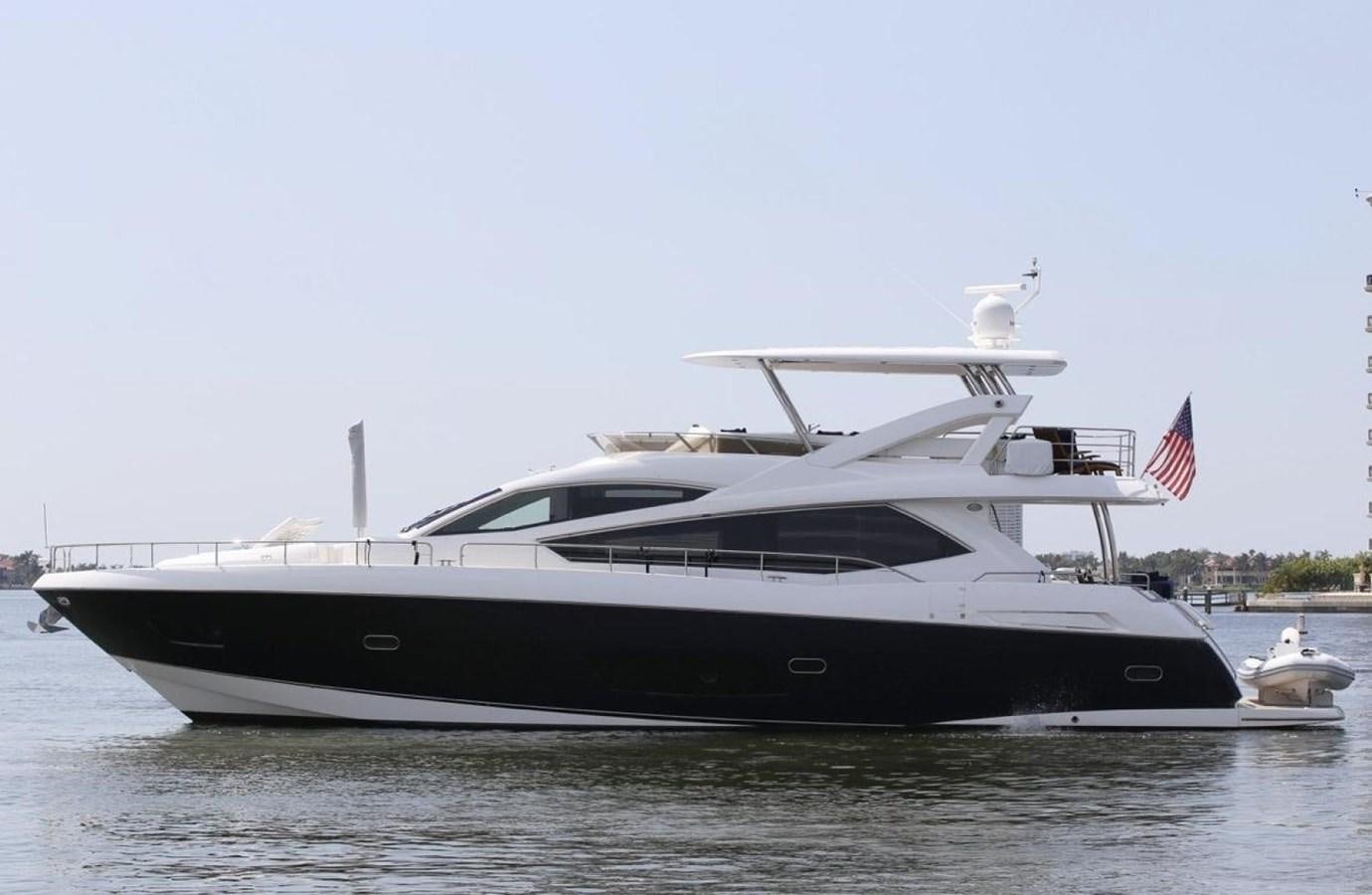 a yacht on the water aboard SUNSEEKER 74 2012 SEA C Yacht for Sale