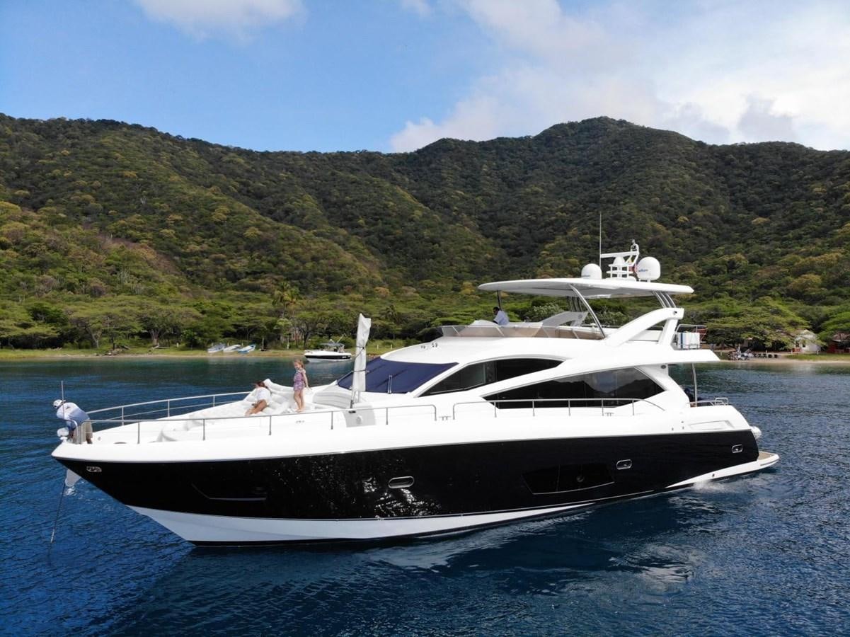 a boat on the water aboard SUNSEEKER 74 2012 SEA C Yacht for Sale