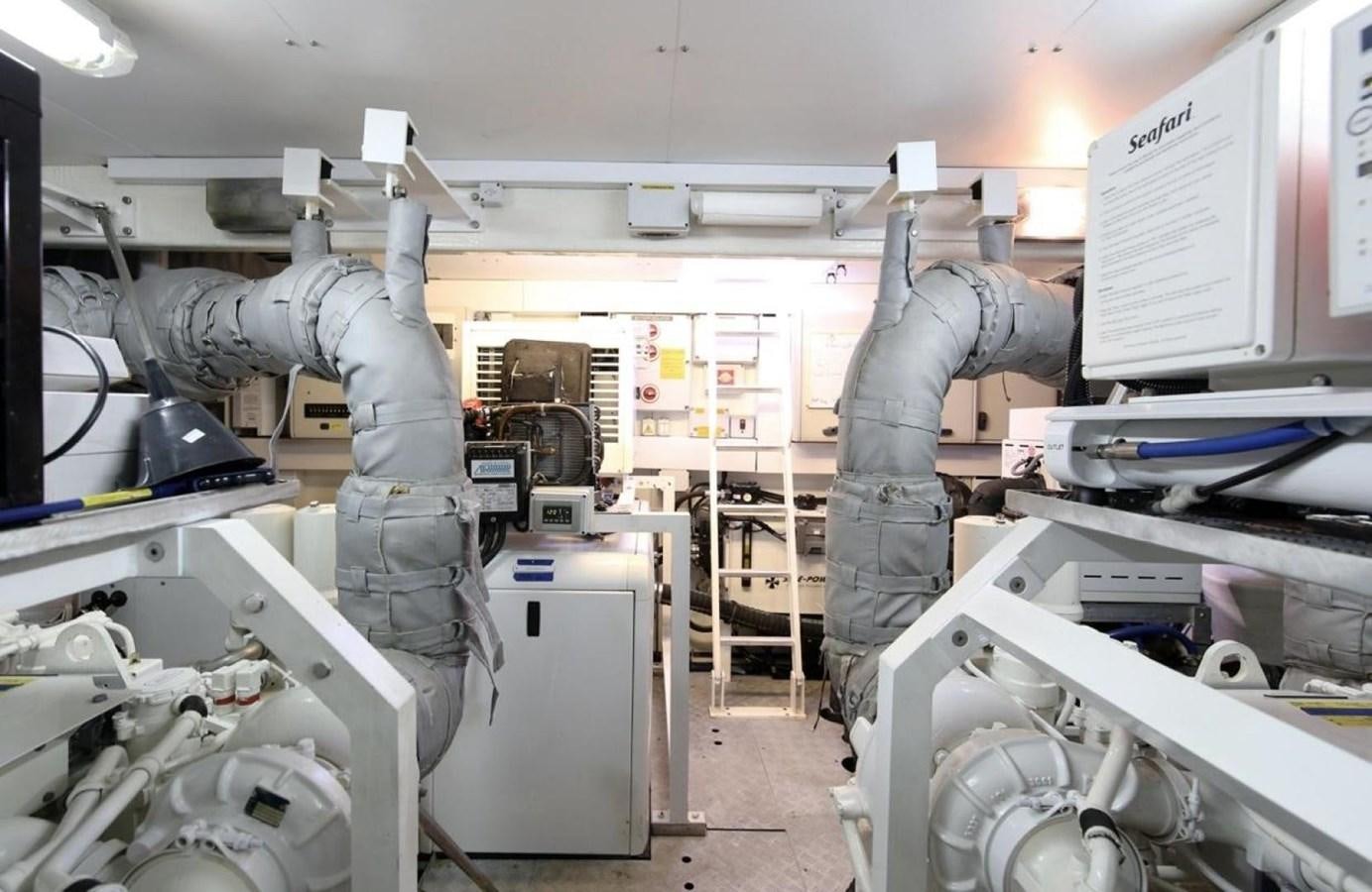 a person working in a factory aboard SUNSEEKER 74 2012 SEA C Yacht for Sale