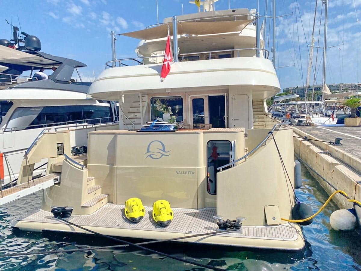 a boat docked at a pier aboard O Yacht for Sale