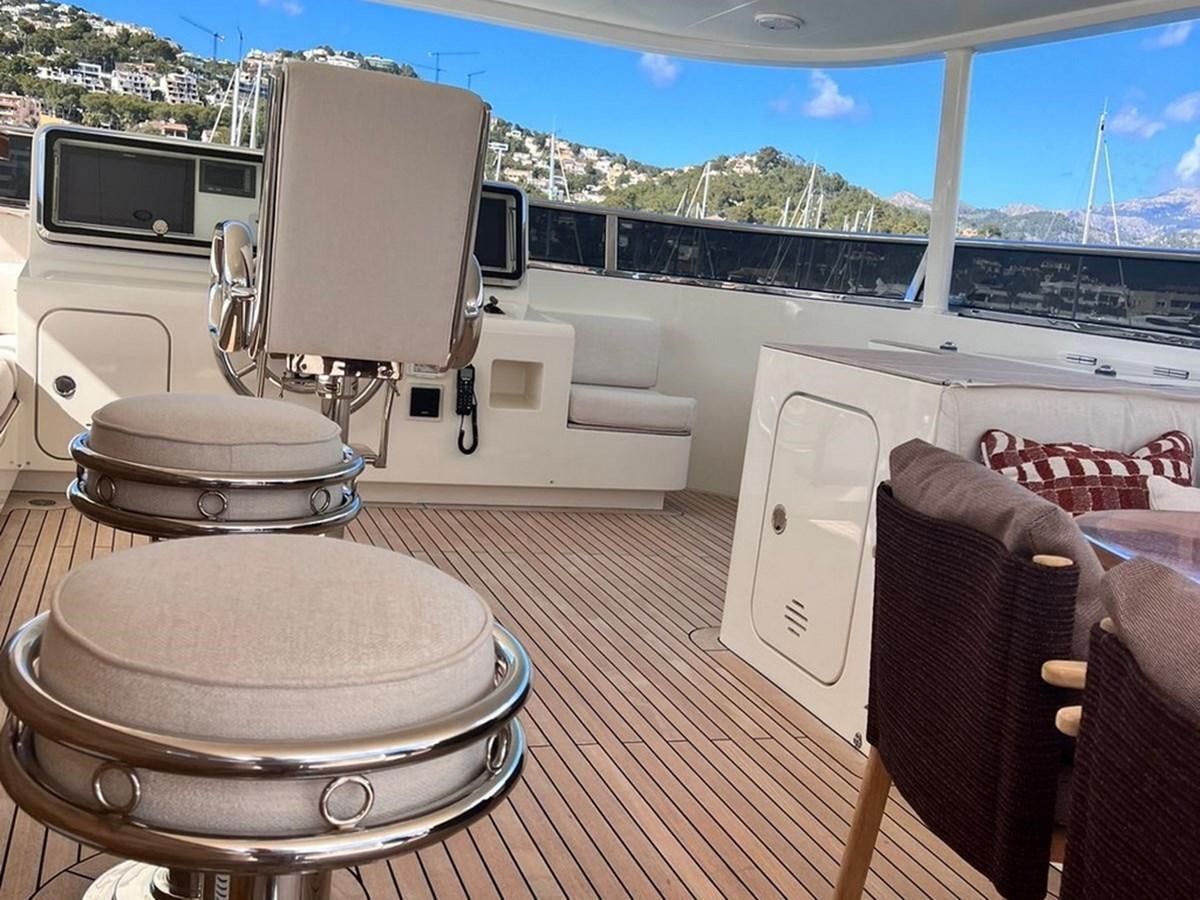 a boat on a deck aboard O Yacht for Sale
