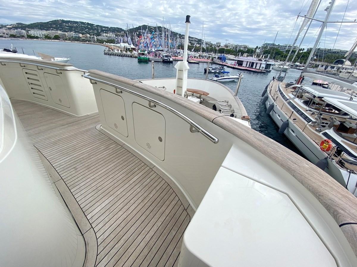 a view of a city from a balcony aboard O Yacht for Sale