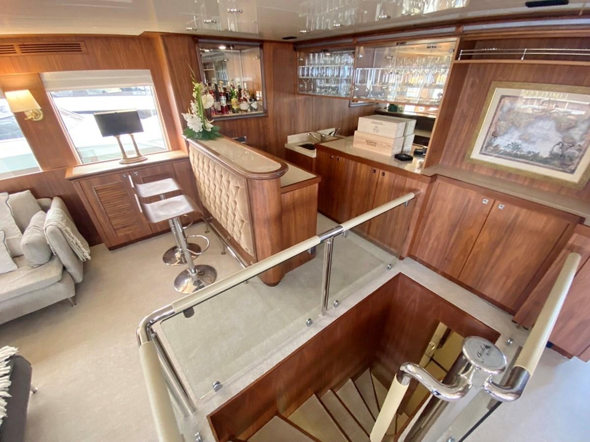 a room with a bed and a couch aboard O Yacht for Sale
