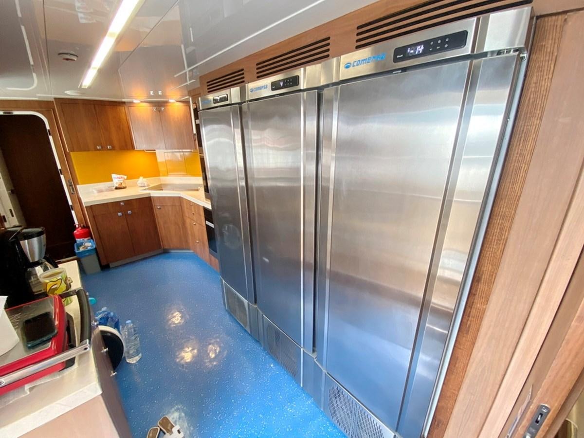 a large room with a large shower unit and a sink aboard O Yacht for Sale