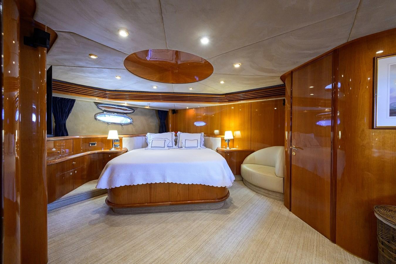 a large bedroom with a large bed aboard MISTRAL Yacht for Sale