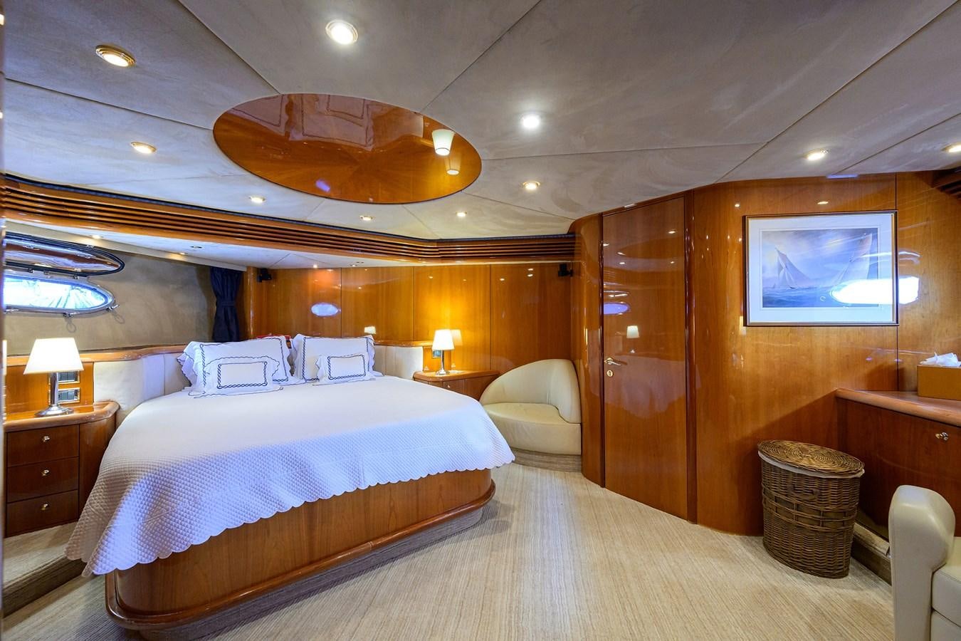 a large bedroom with a large bed aboard MISTRAL Yacht for Sale