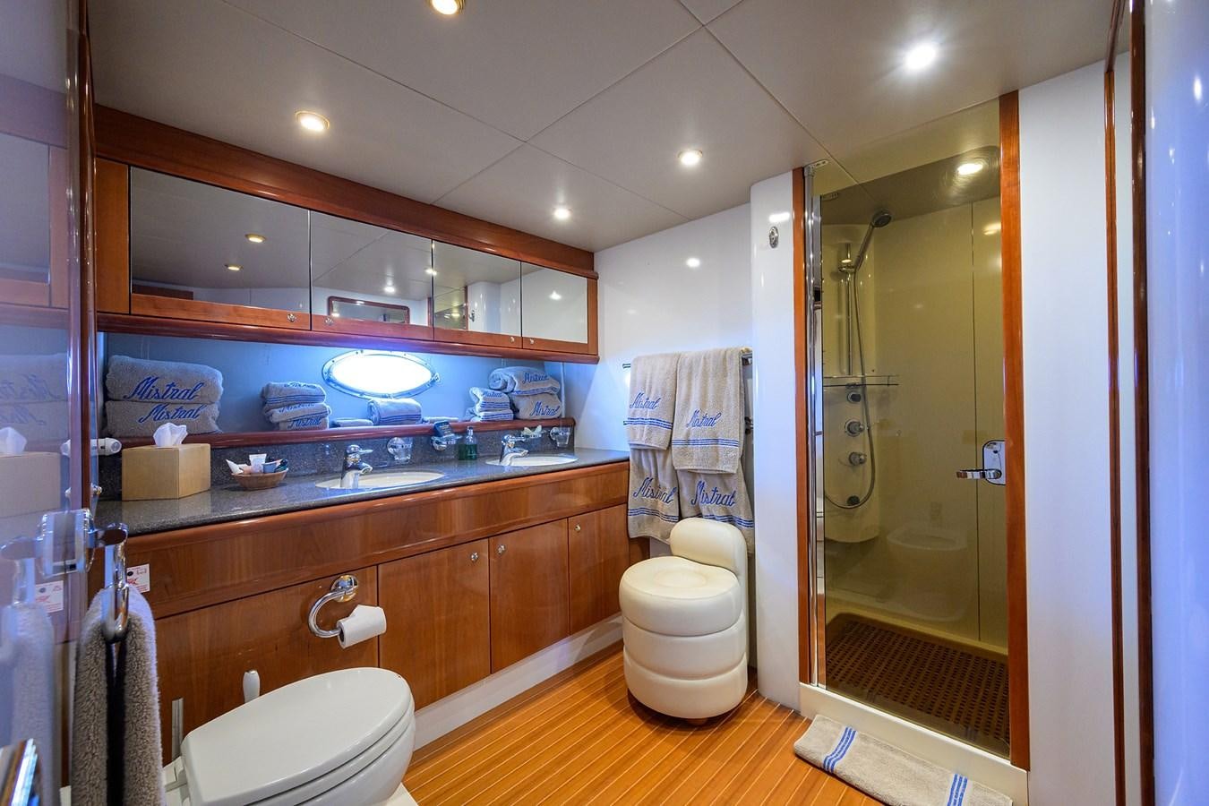 a bathroom with a glass shower aboard MISTRAL Yacht for Sale