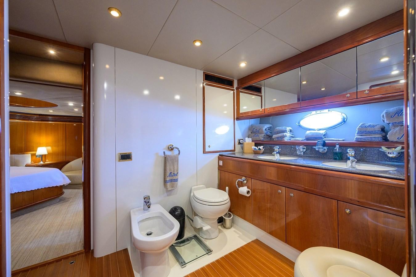 a bathroom with a large mirror aboard MISTRAL Yacht for Sale