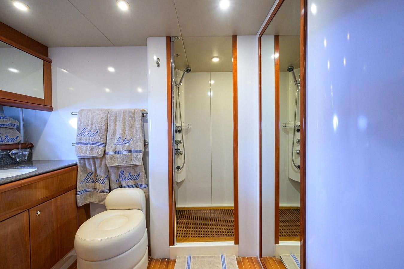 a bathroom with a standup shower aboard MISTRAL Yacht for Sale
