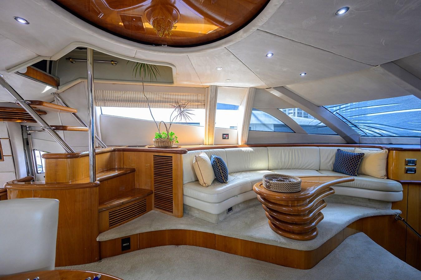 a room with a couch and a table aboard MISTRAL Yacht for Sale