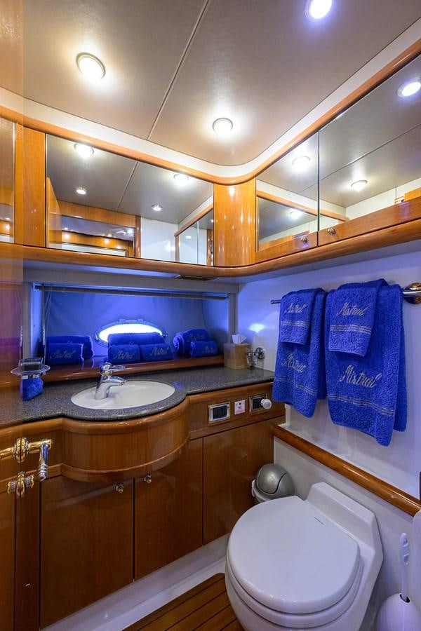 a bathroom with a sink and a mirror aboard MISTRAL Yacht for Sale