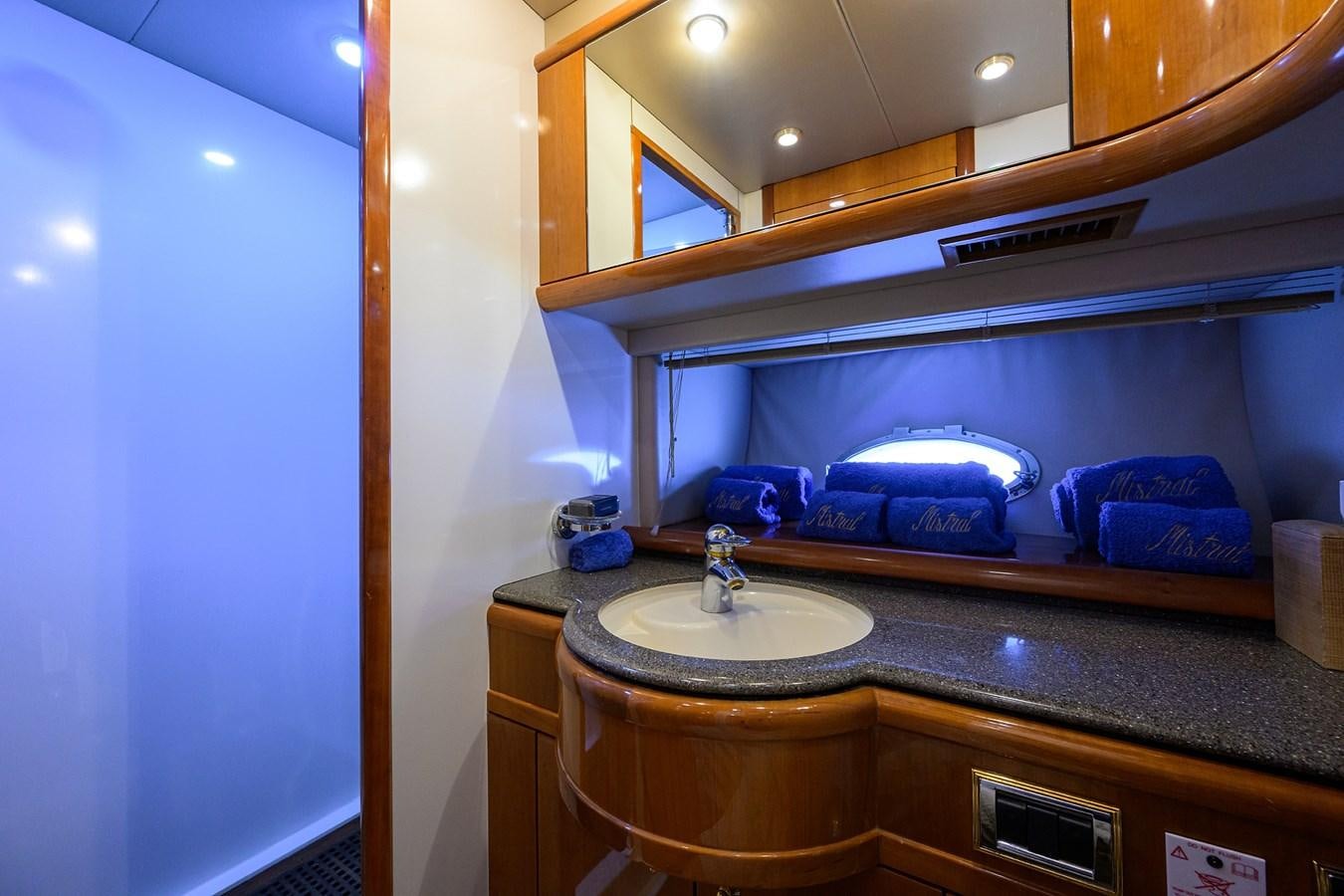 a bathroom with a sink and a mirror aboard MISTRAL Yacht for Sale