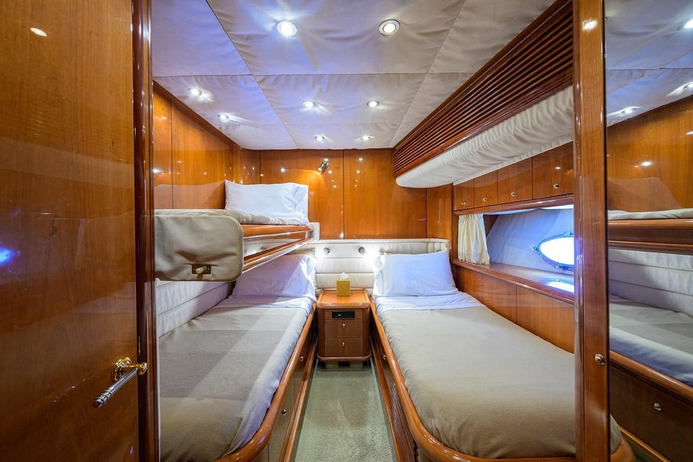 a room with two beds aboard MISTRAL Yacht for Sale
