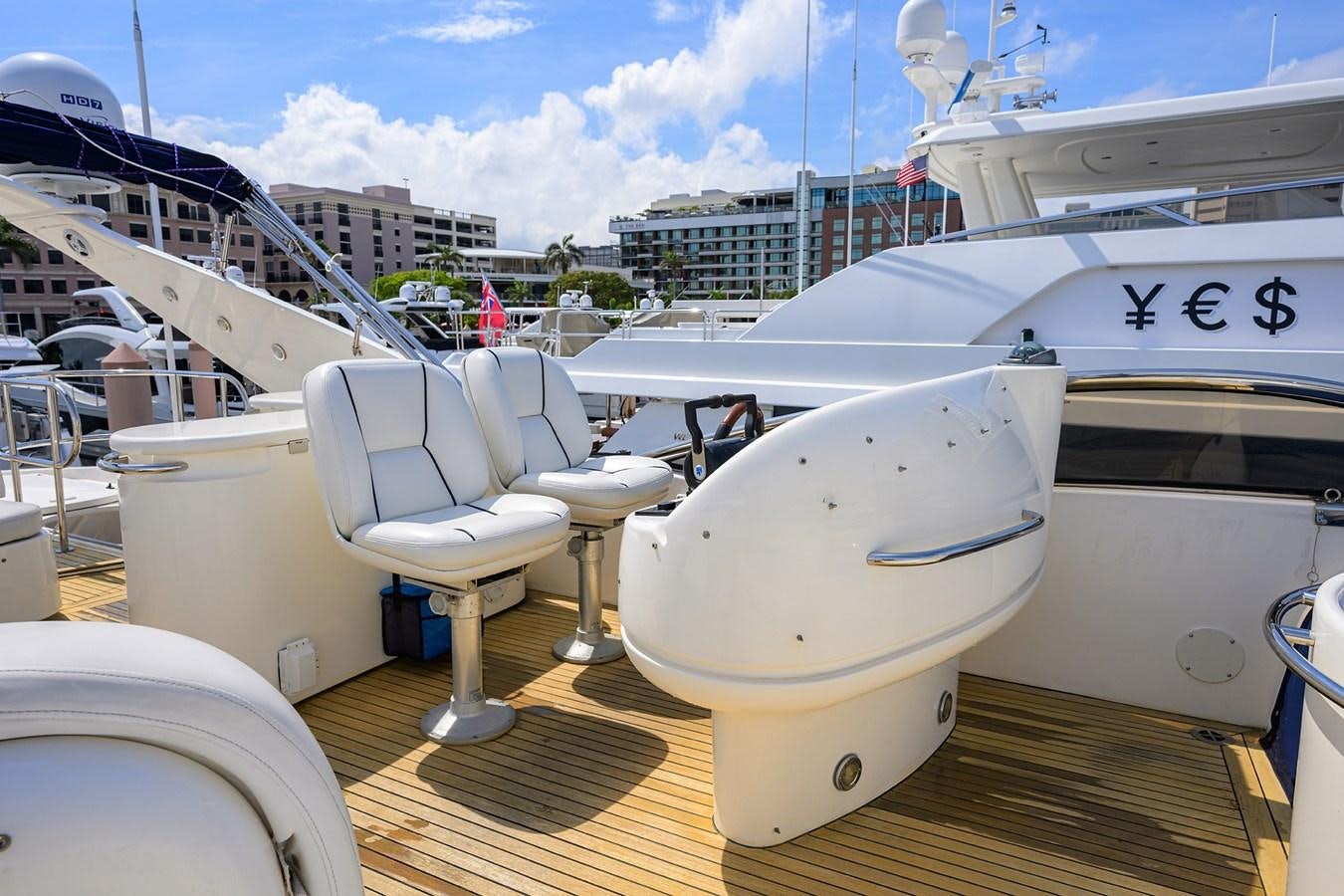a group of white boats on a dock aboard MISTRAL Yacht for Sale