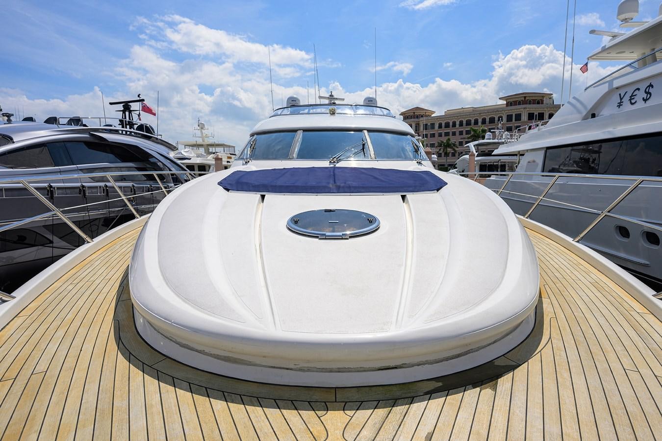 a large white boat on a dock aboard MISTRAL Yacht for Sale