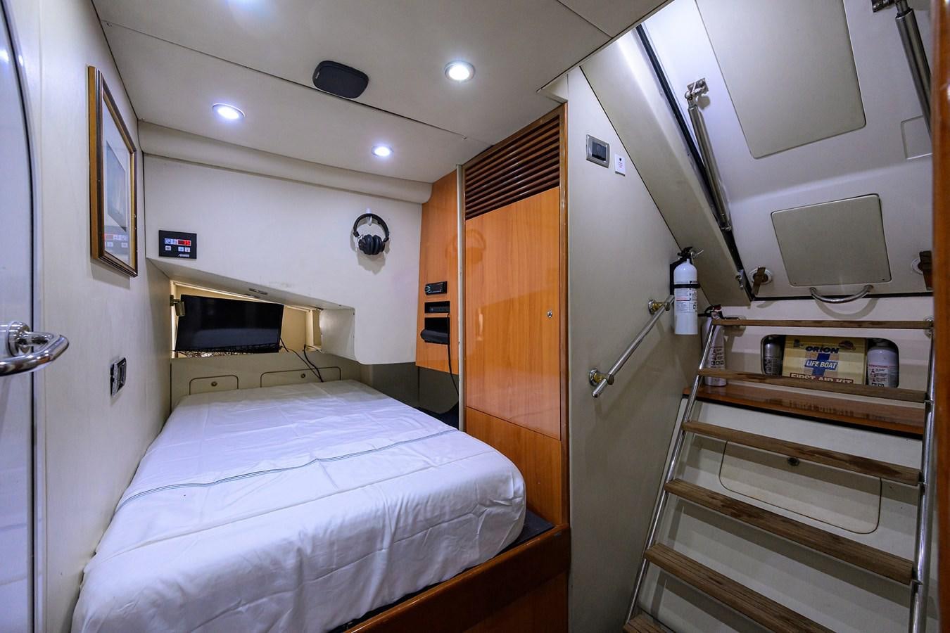 a small bedroom with a bunk bed aboard MISTRAL Yacht for Sale