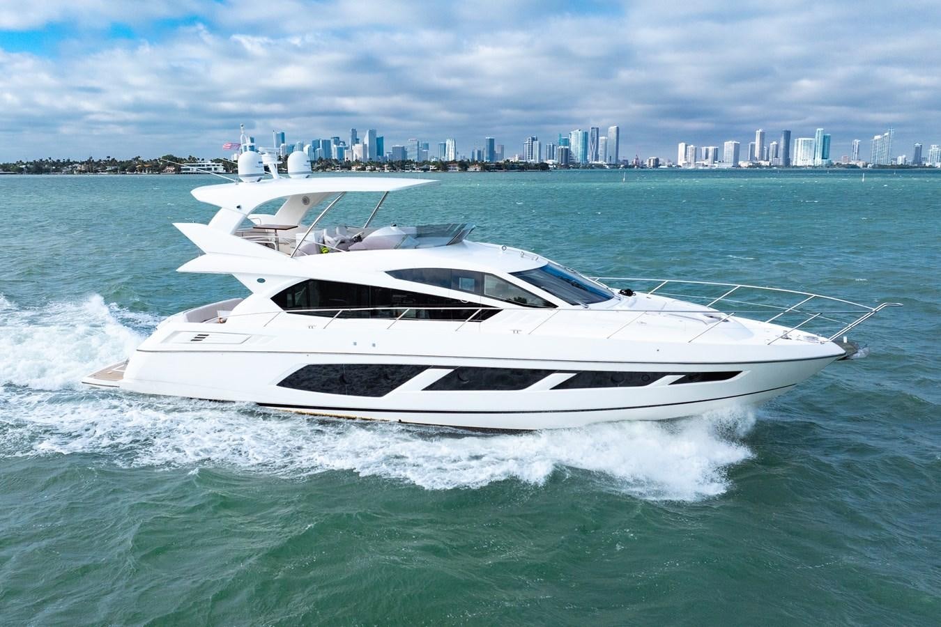 a white yacht in the water aboard SHANTI Yacht for Sale