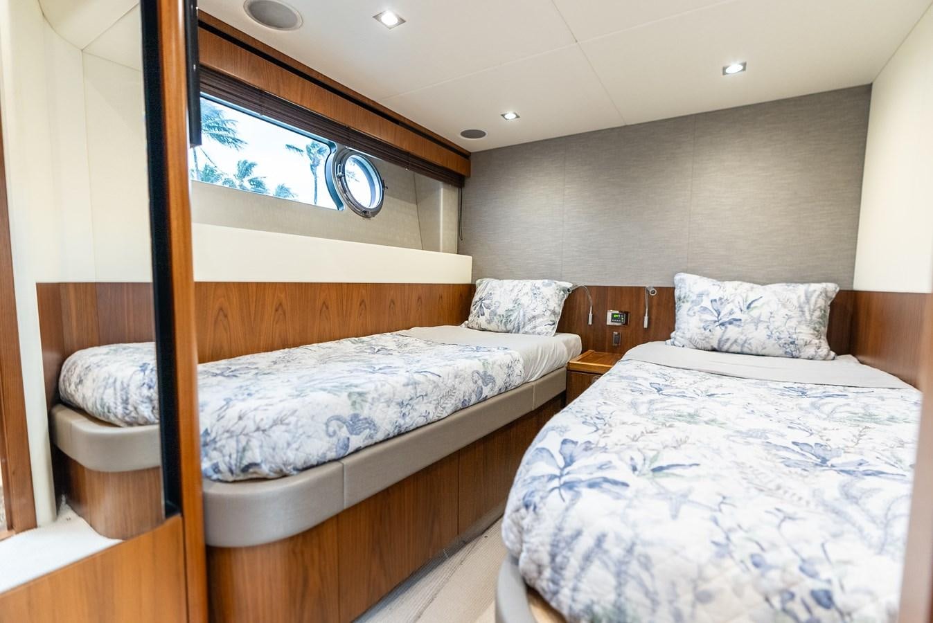 a couple of beds in a room aboard SHANTI Yacht for Sale