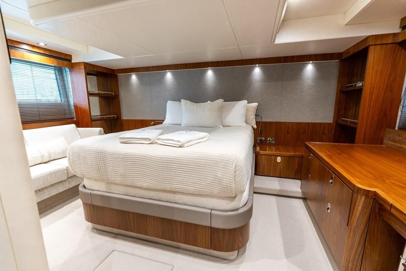 a bed in a room aboard SHANTI Yacht for Sale
