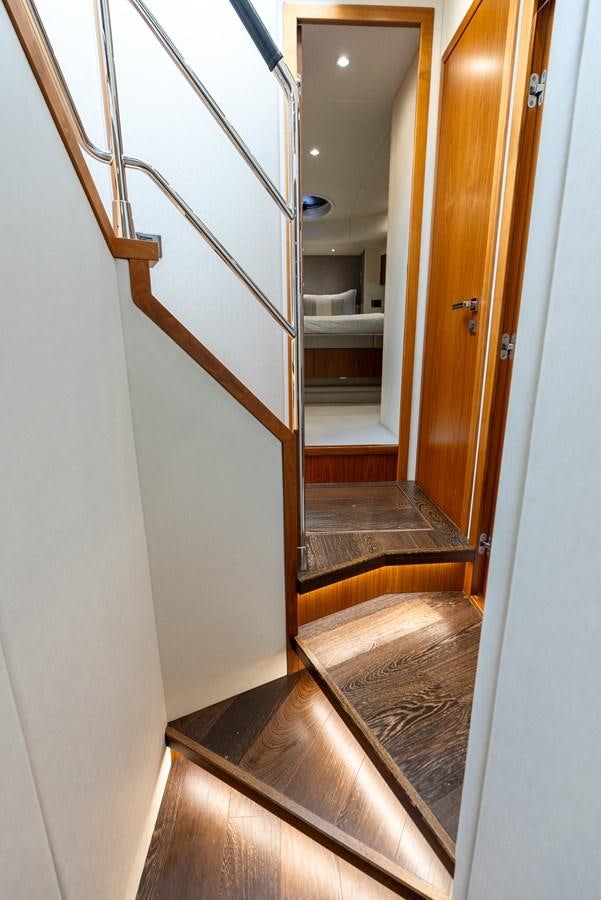 a hallway with a door aboard SHANTI Yacht for Sale