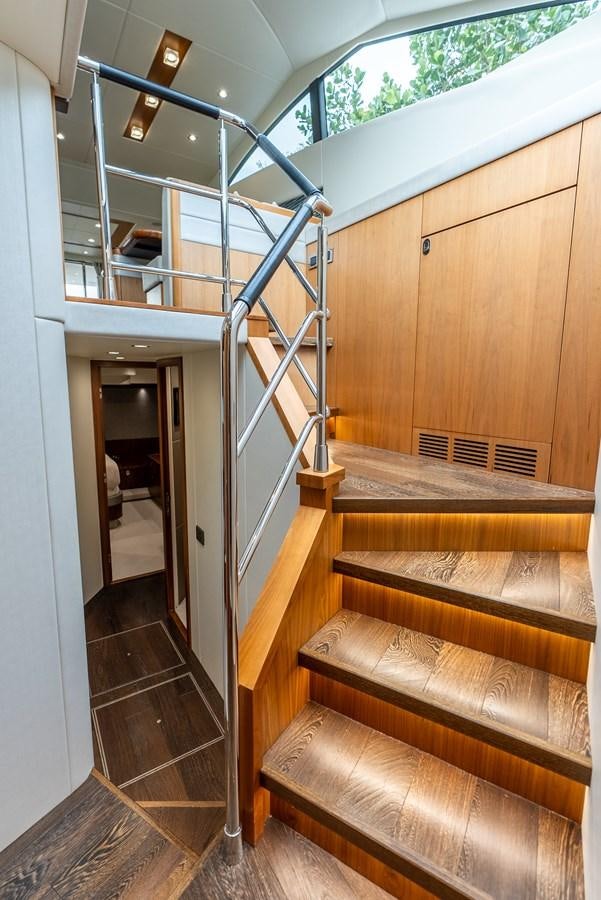a staircase in a house aboard SHANTI Yacht for Sale