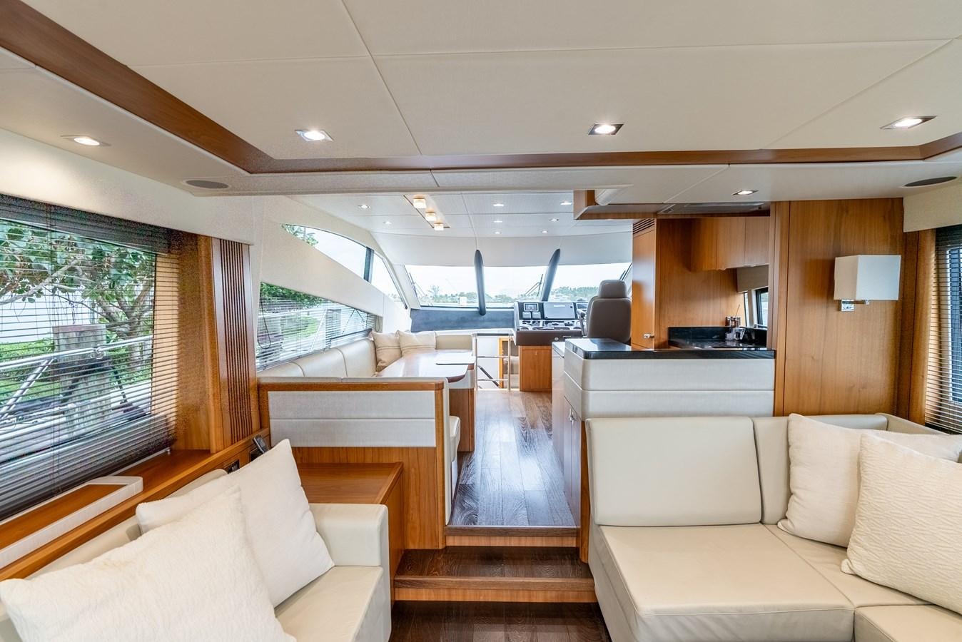 a room with a couch and a television aboard SHANTI Yacht for Sale