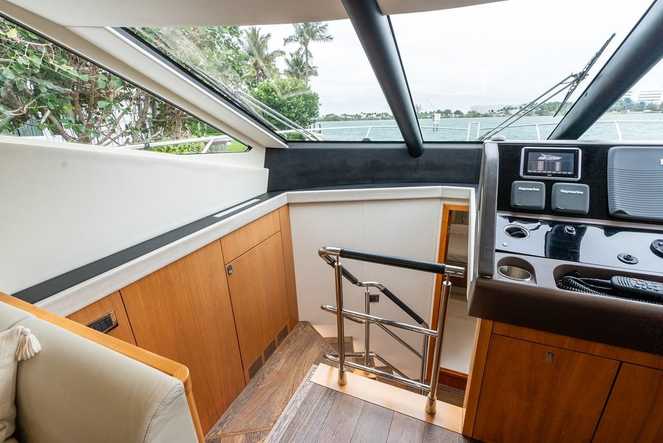 a room with a table and a chair aboard SHANTI Yacht for Sale