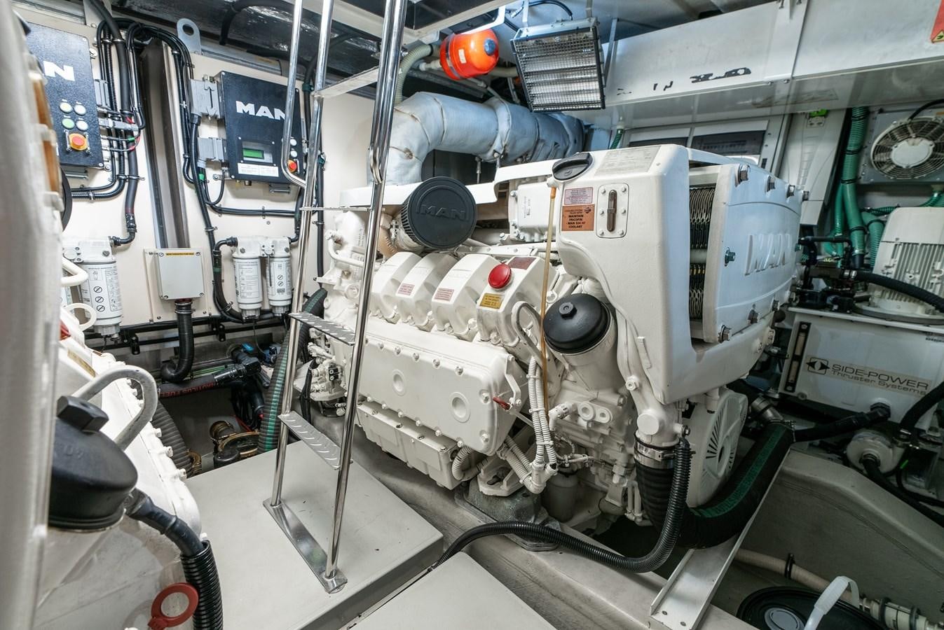 a large white machine in a room aboard SHANTI Yacht for Sale