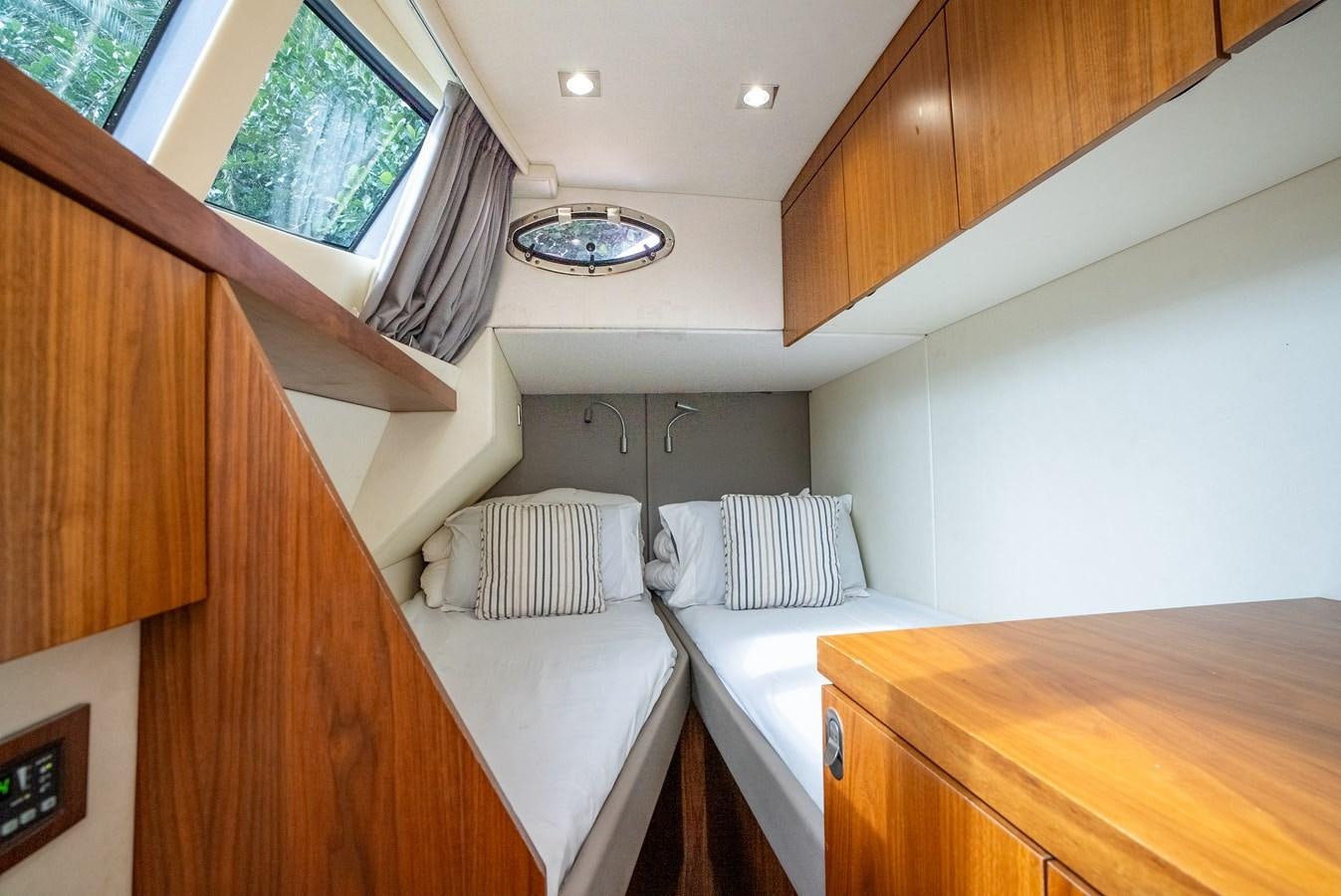 a room with two beds aboard SHANTI Yacht for Sale