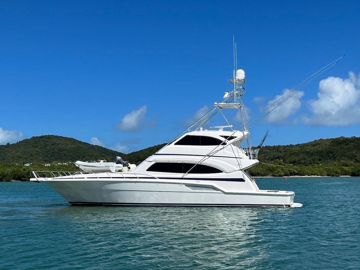 a white yacht in the water aboard BEACH BUM Yacht for Sale