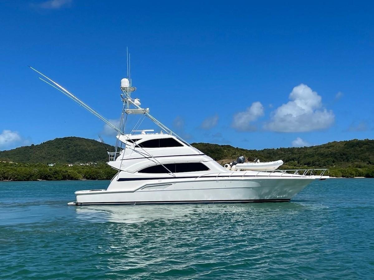 a white yacht in the water aboard BEACH BUM Yacht for Sale