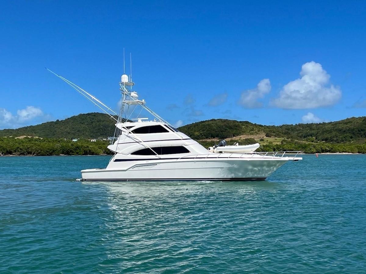 a white yacht in the water aboard BEACH BUM Yacht for Sale