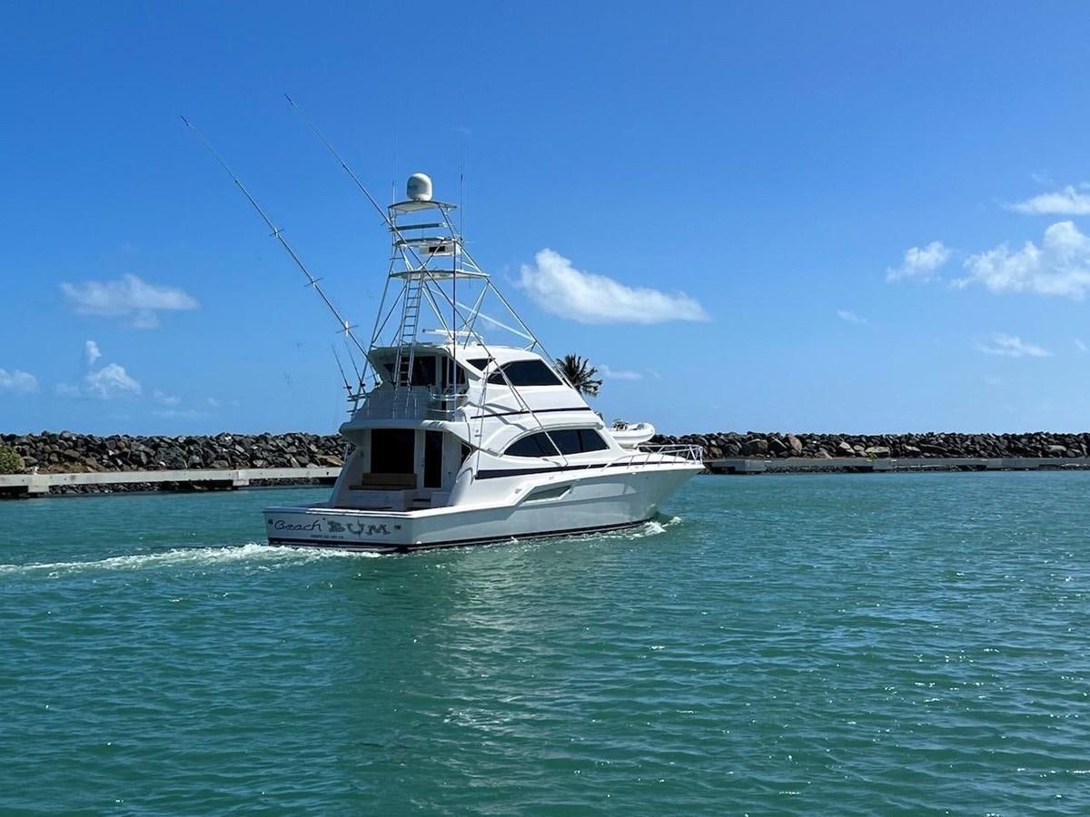 a boat on the water aboard BEACH BUM Yacht for Sale