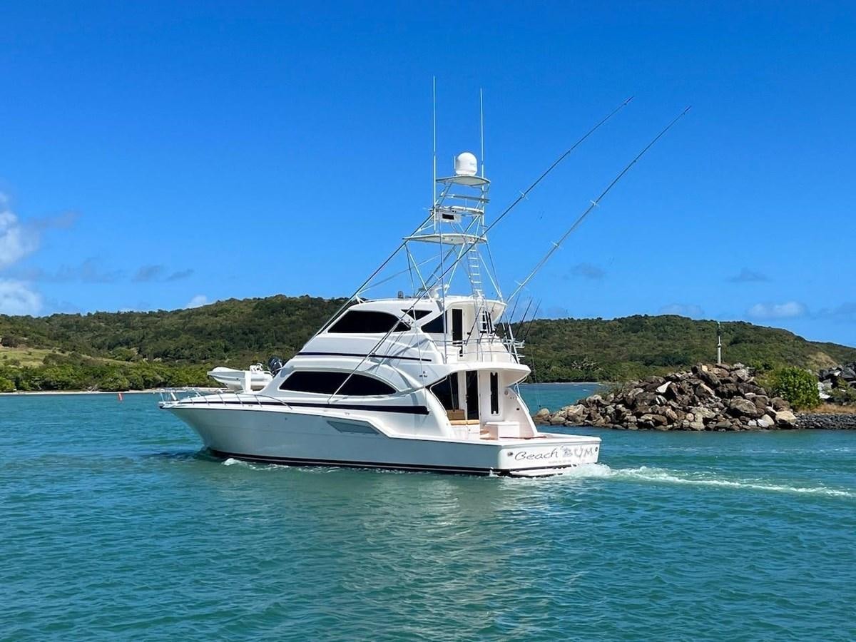 a boat on the water aboard BEACH BUM Yacht for Sale