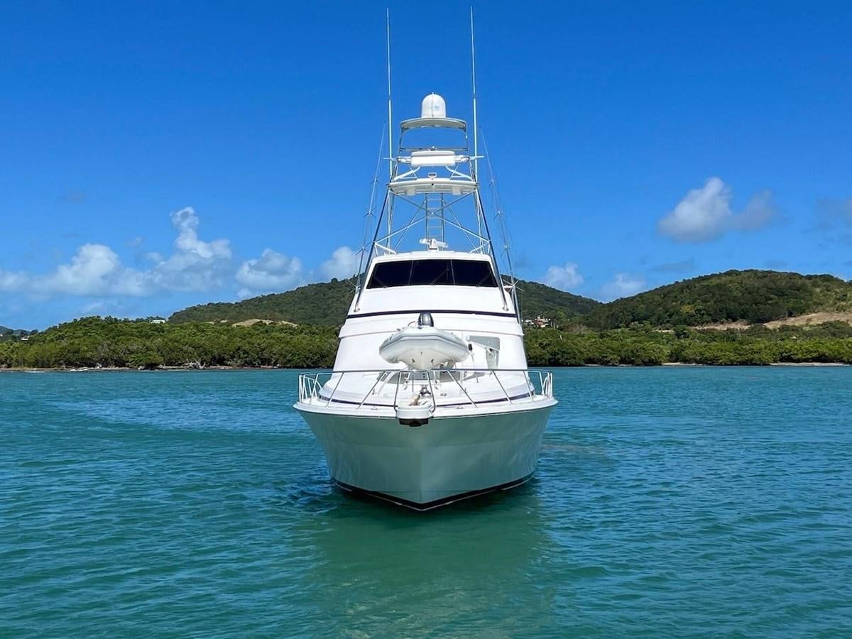a white boat in the water aboard BEACH BUM Yacht for Sale