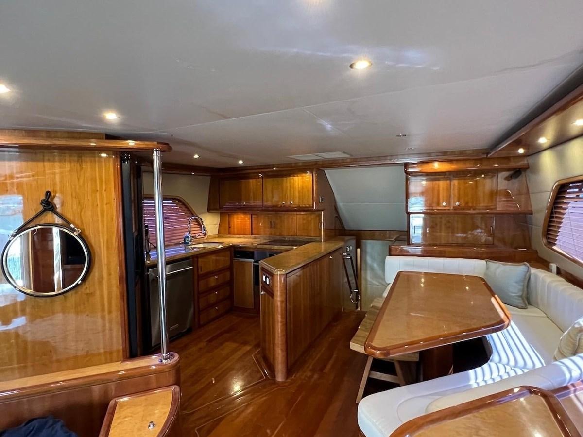 a large kitchen and living room aboard BEACH BUM Yacht for Sale