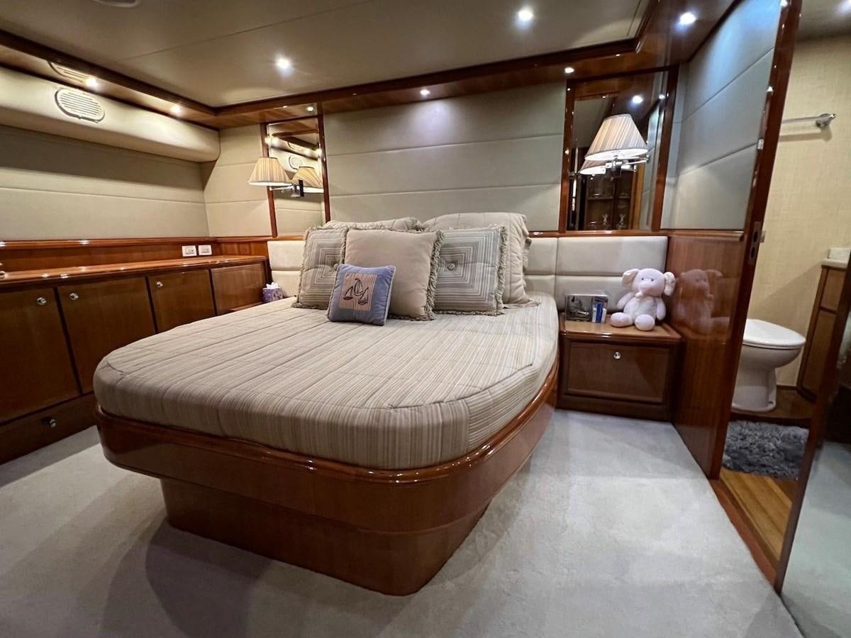a bed in a room aboard BEACH BUM Yacht for Sale