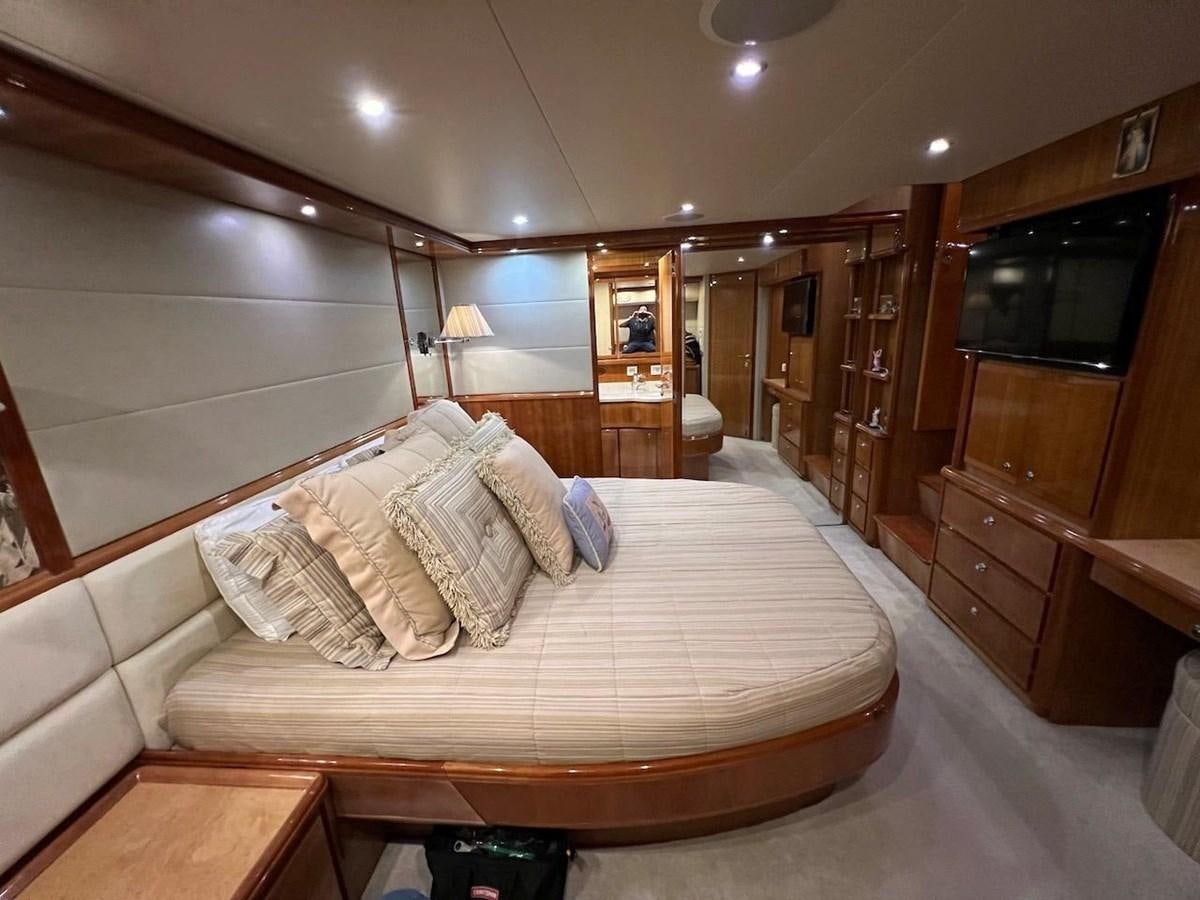 a large bed in a hotel room aboard BEACH BUM Yacht for Sale