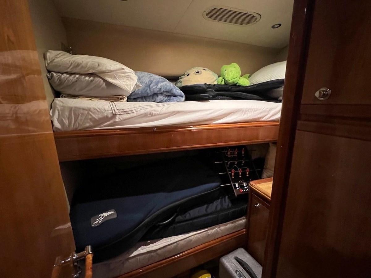 a suitcase with clothes on it aboard BEACH BUM Yacht for Sale