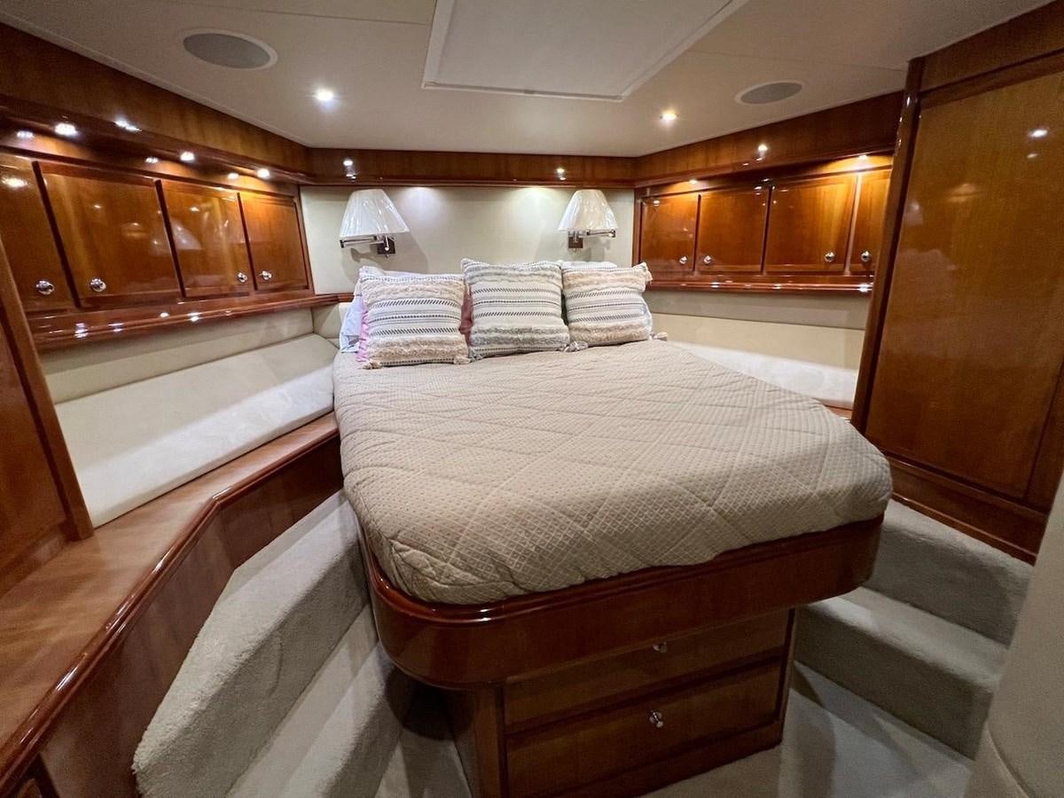 a large bed in a room aboard BEACH BUM Yacht for Sale