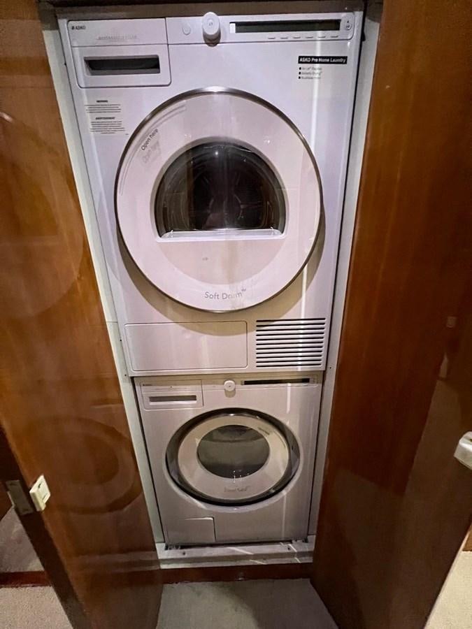 a white washing machine aboard BEACH BUM Yacht for Sale