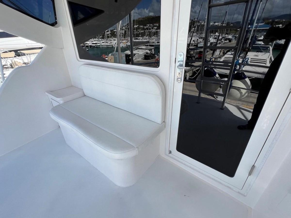 a white toilet in a room aboard BEACH BUM Yacht for Sale