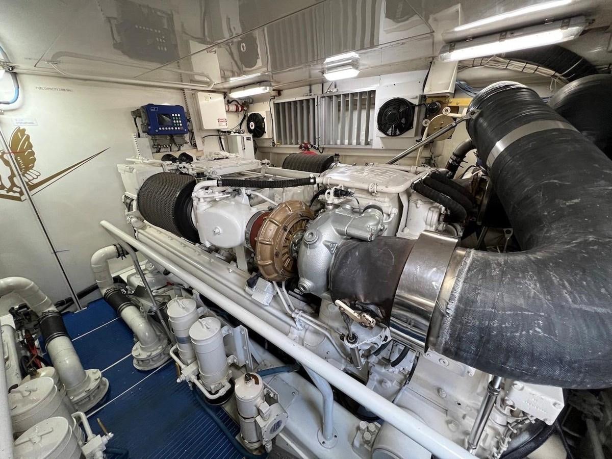 a machine with a large metal cylinder aboard BEACH BUM Yacht for Sale