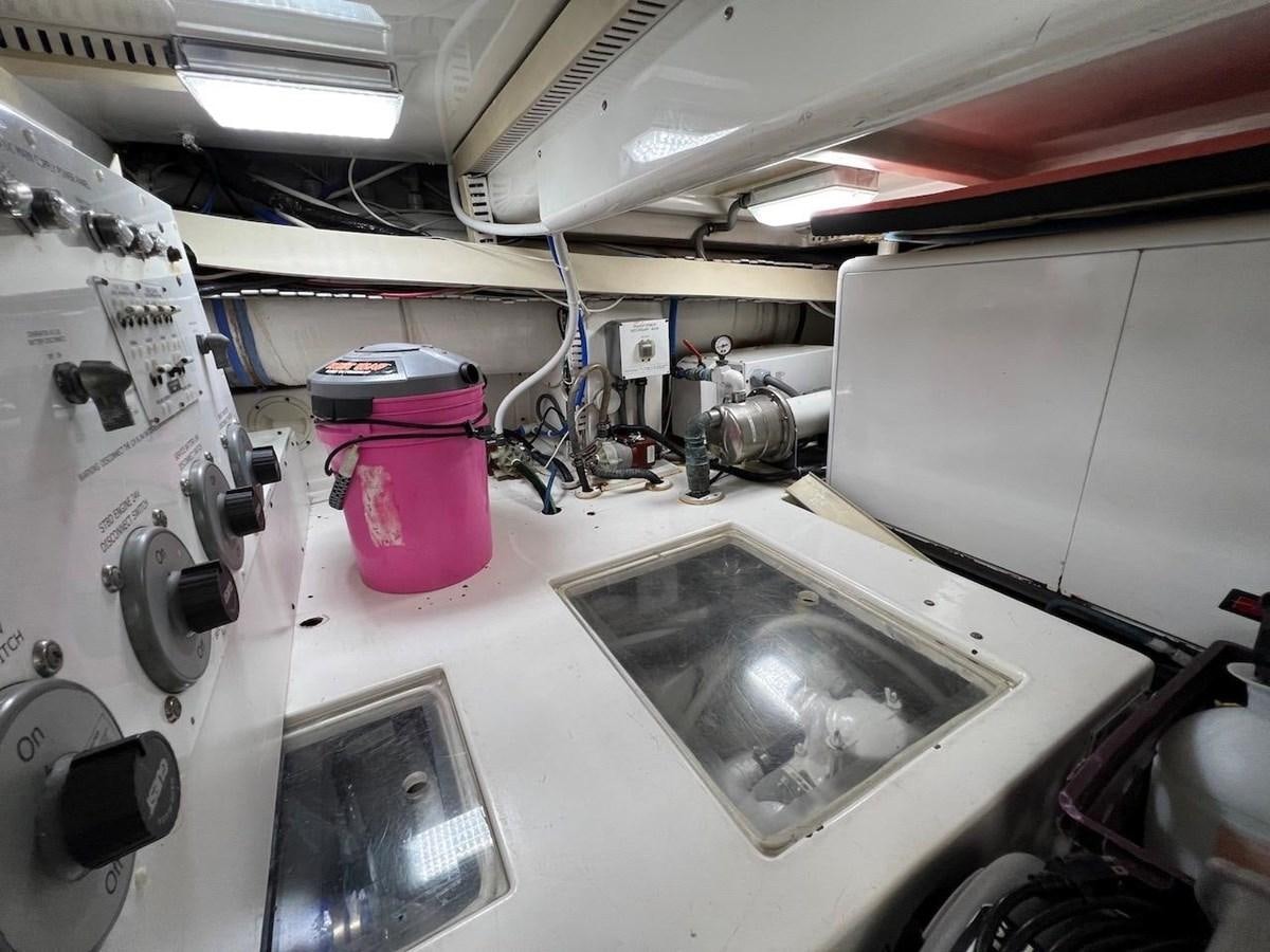 a machine with a large pink bucket aboard BEACH BUM Yacht for Sale