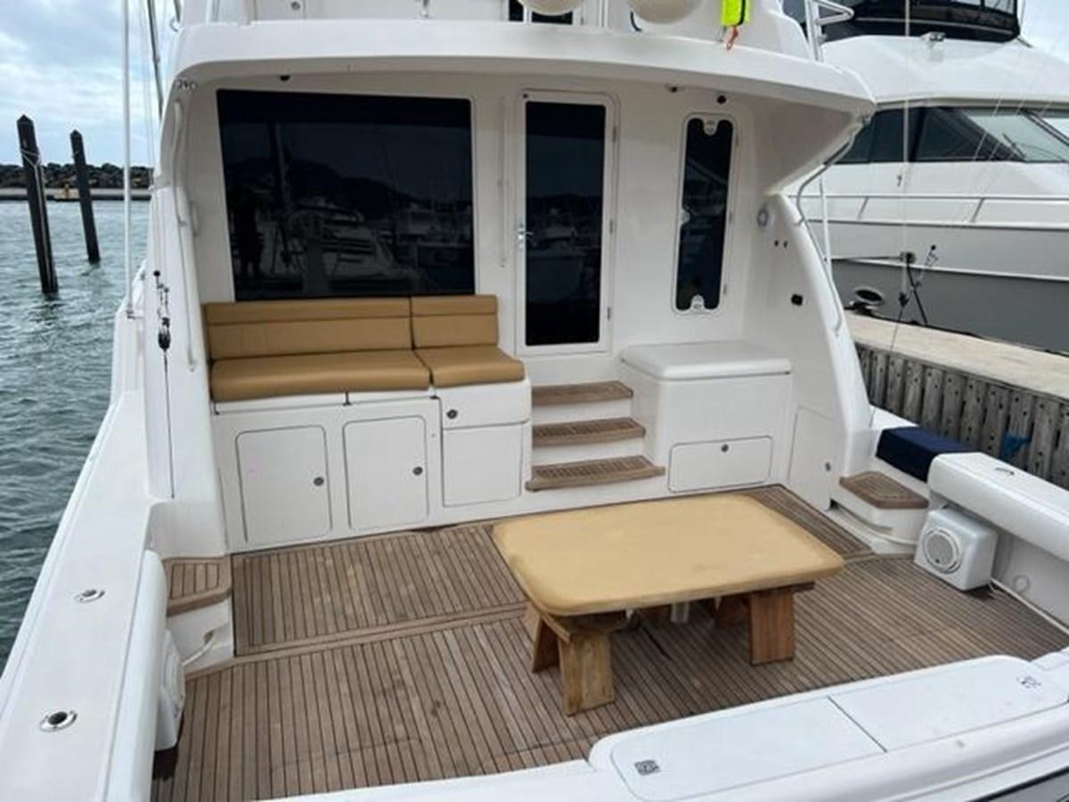 a boat on the water aboard BEACH BUM Yacht for Sale
