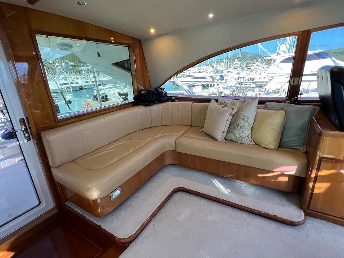a couch in a room aboard BEACH BUM Yacht for Sale