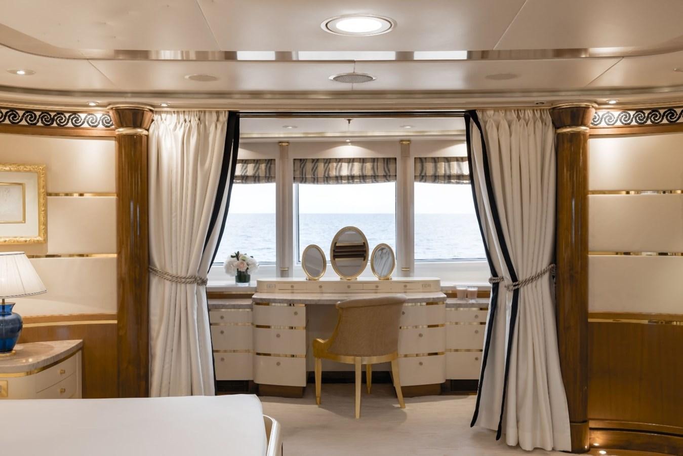 a room with a desk and a chair aboard OLYMPUS Yacht for Sale